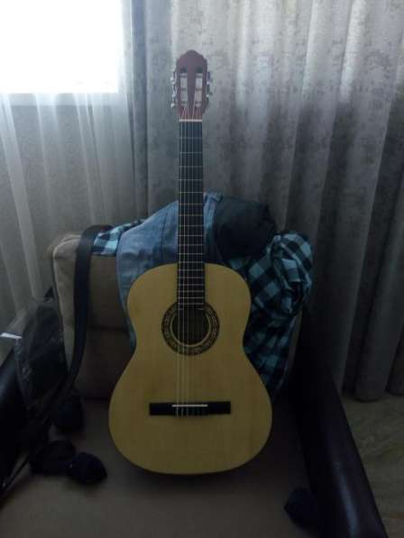 Продам гитару новую названия гитары Мартинец