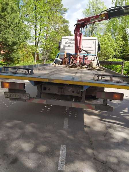 Услуги мощного эвакуатора манипулятора