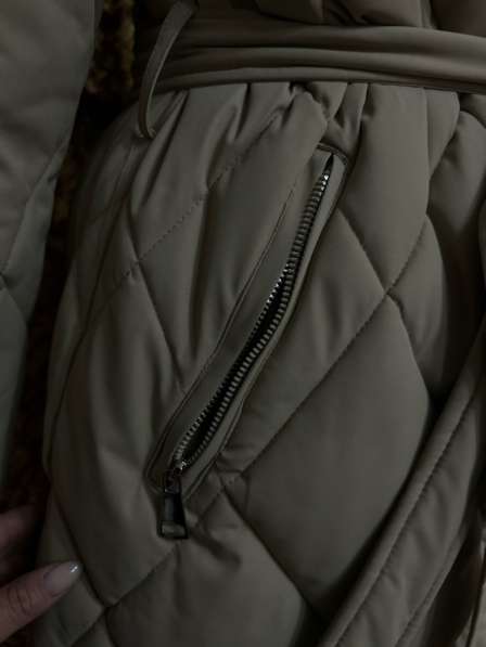 Продам пуховик в фото 4