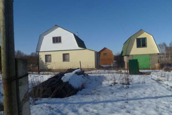 Новый рубленый дом+баня+гараж на участке 15 соток в деревне