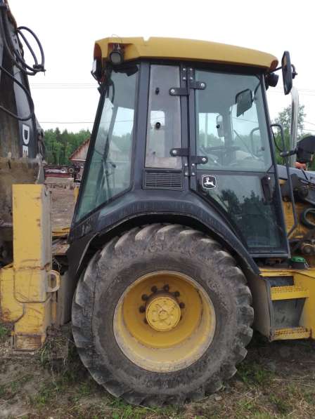 Продам экскаватор погрузчик John Deere, 2012г/в в Перми